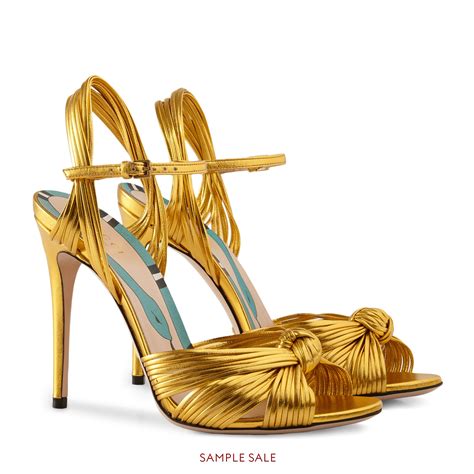 gold Gucci heels